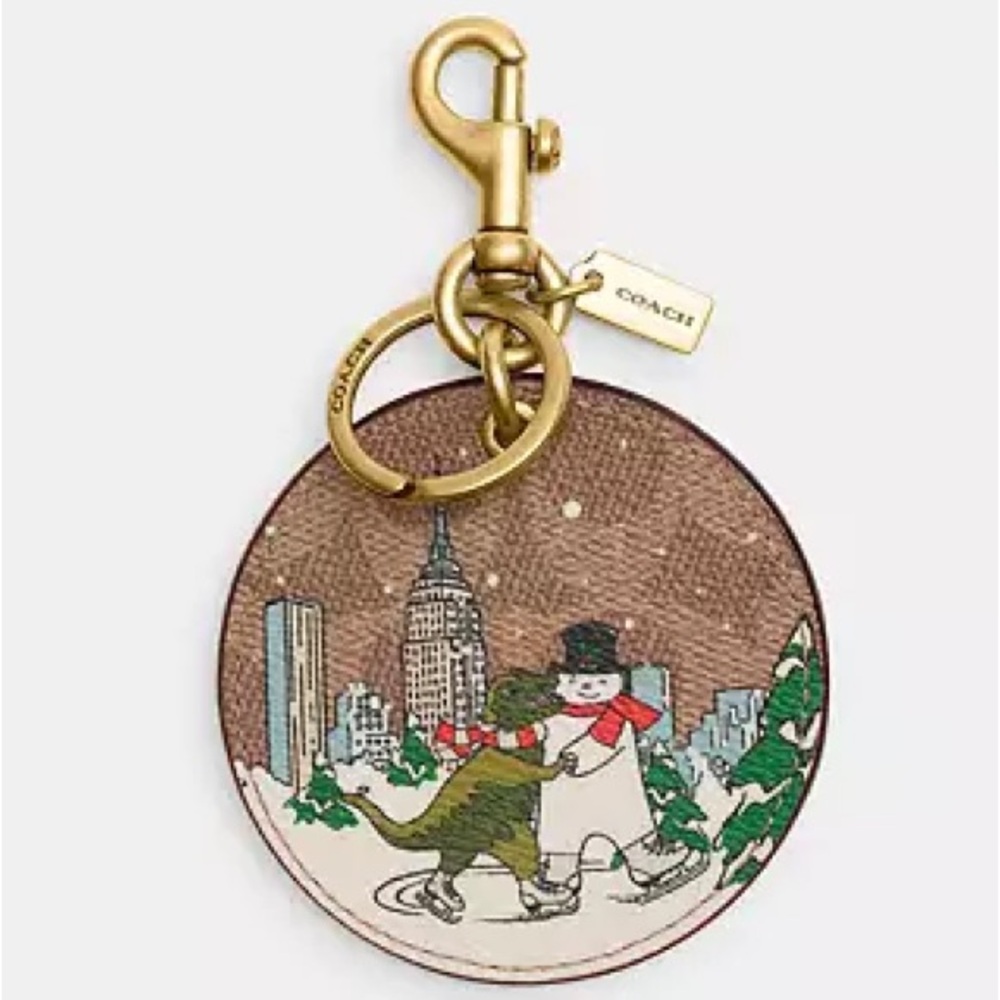 Coach Holiday Bag Charm In Signature Canvas With Rexy And Snowman